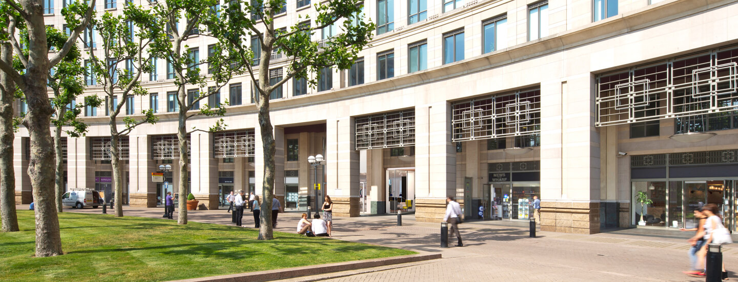 People walking in front of The Columbus Building